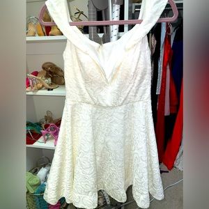 Brand new lace white mini dress with drape shoulders